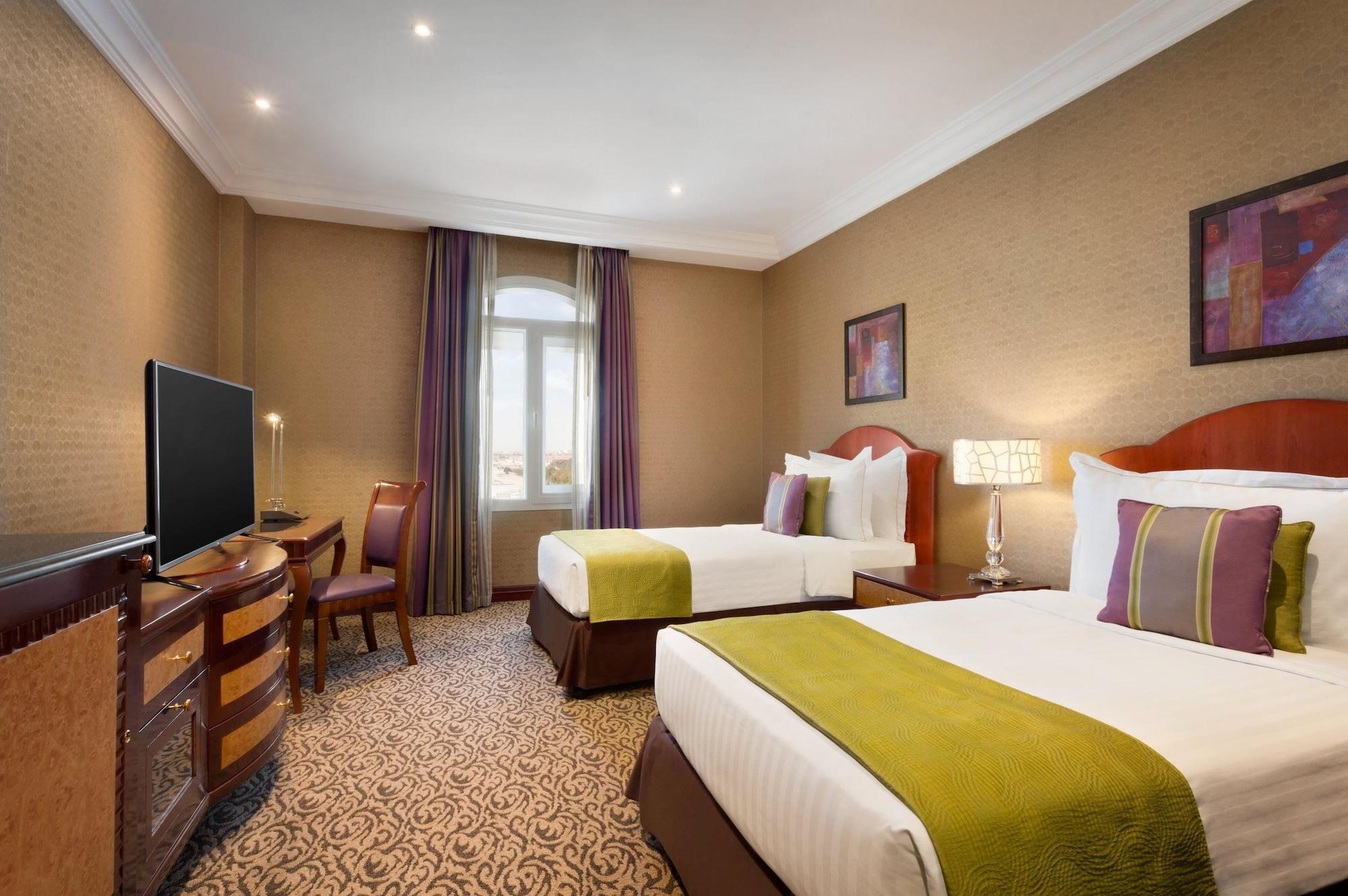 Grand Regency Doha, Trademark Collection By Wyndham Bagian luar foto Deluxe Room