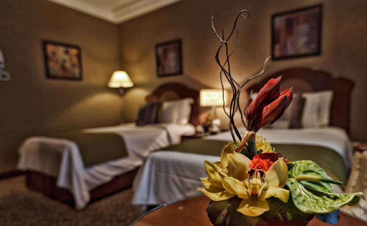 Grand Regency Doha, Trademark Collection By Wyndham Bagian luar foto A guest room at the hotel