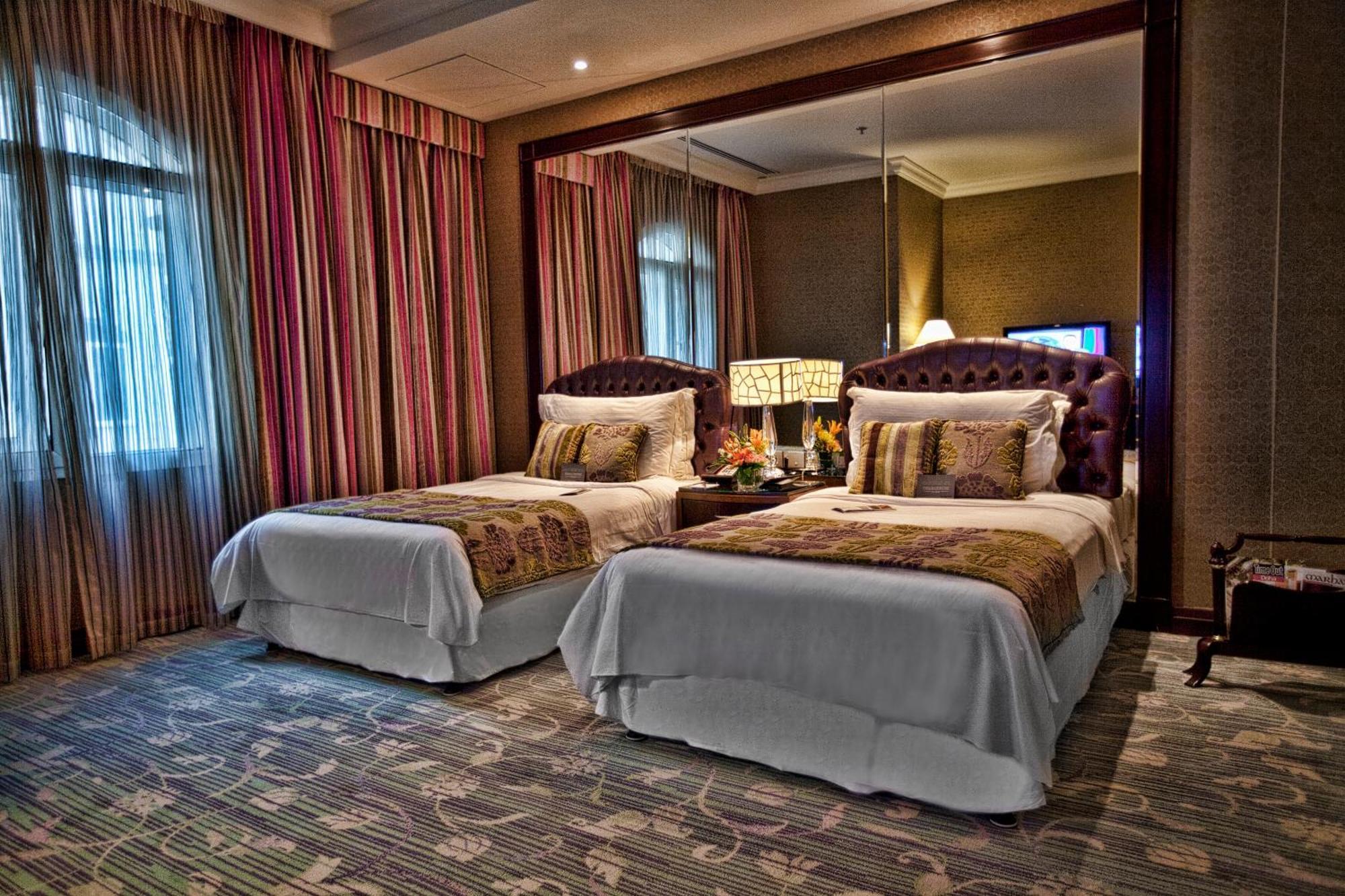 Grand Regency Doha, Trademark Collection By Wyndham Bagian luar foto Deluxe Room